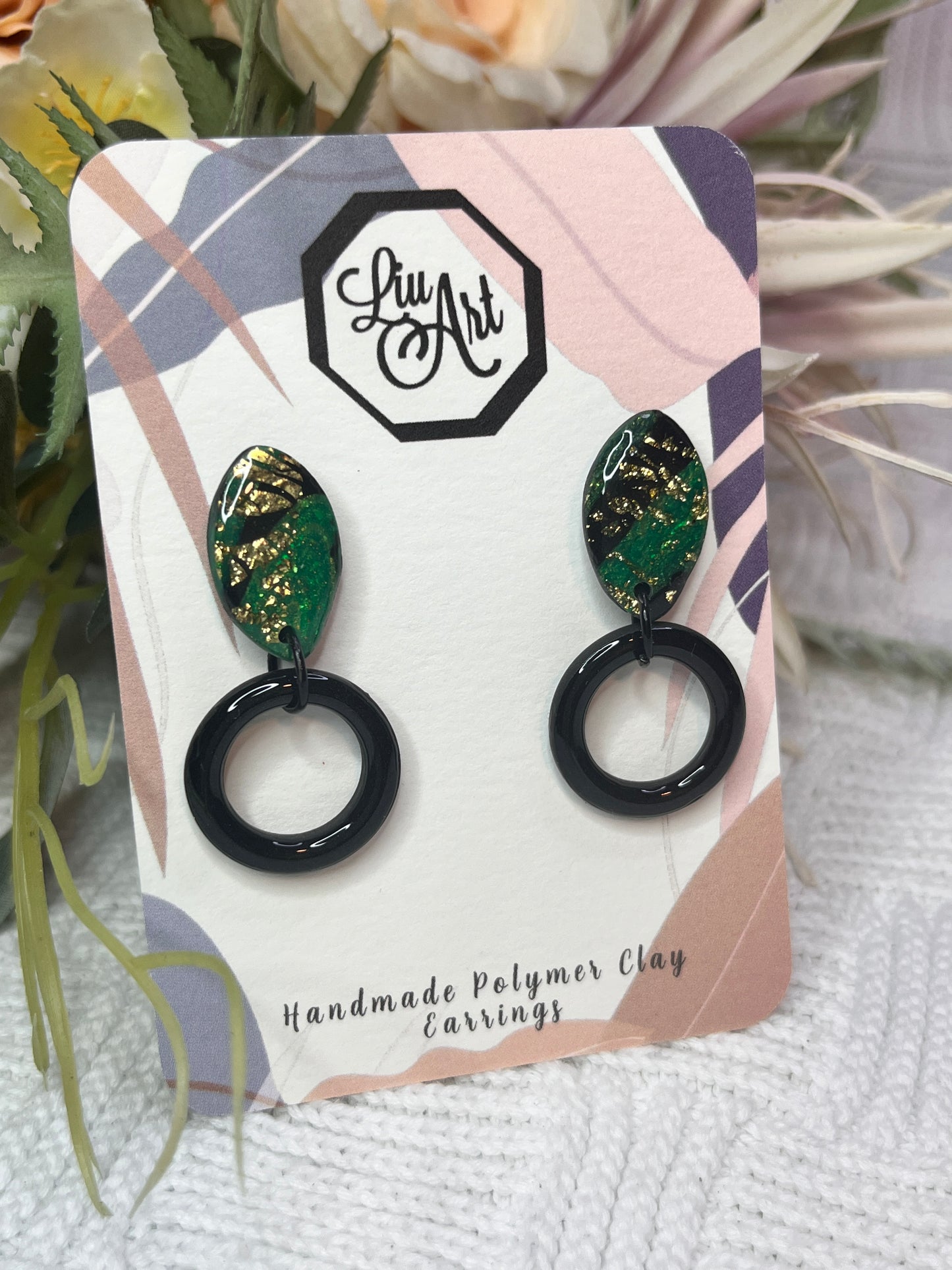 dangling-hoop-polymer-clay-earrings-emerald-orbit-perspective-view